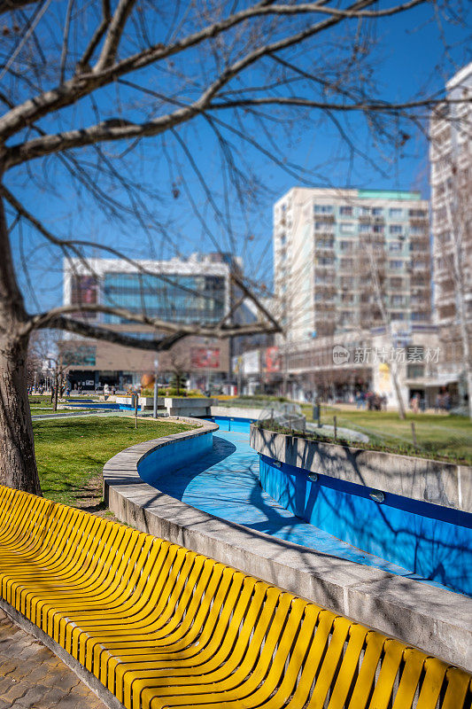 Yellow bench seating in Pitești